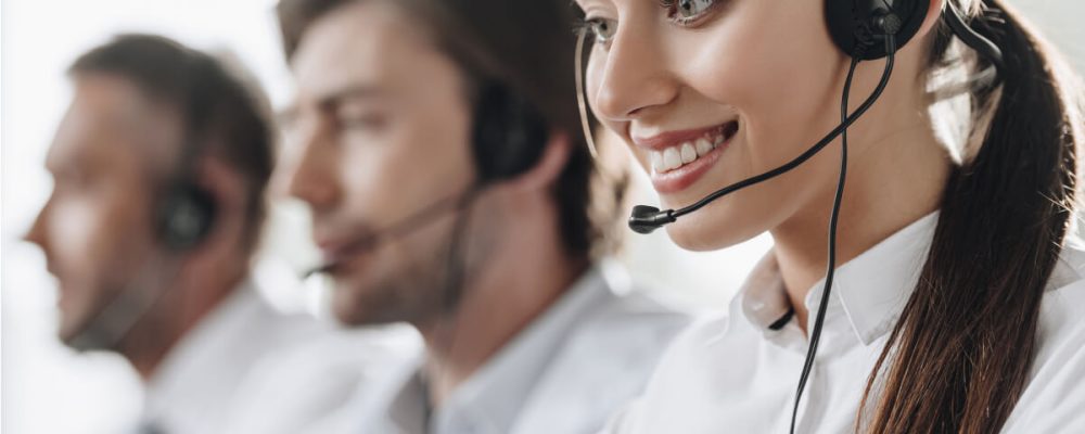 smiling-young-call-center-manageress-working-with-2021-08-29-22-49-55-utc.jpg